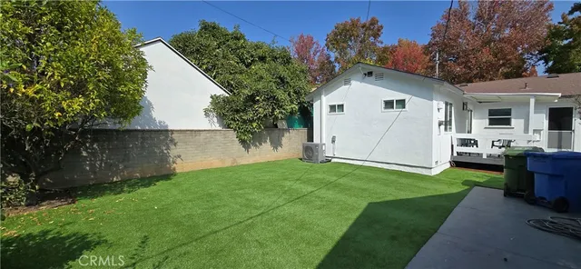 a house view with a garden space