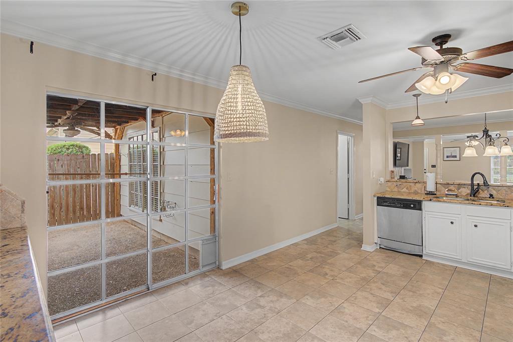 10056 Alondra Street Shreveport, LA 71115 - Photo 13 of 31 a view of a kitchen with a sink and a window