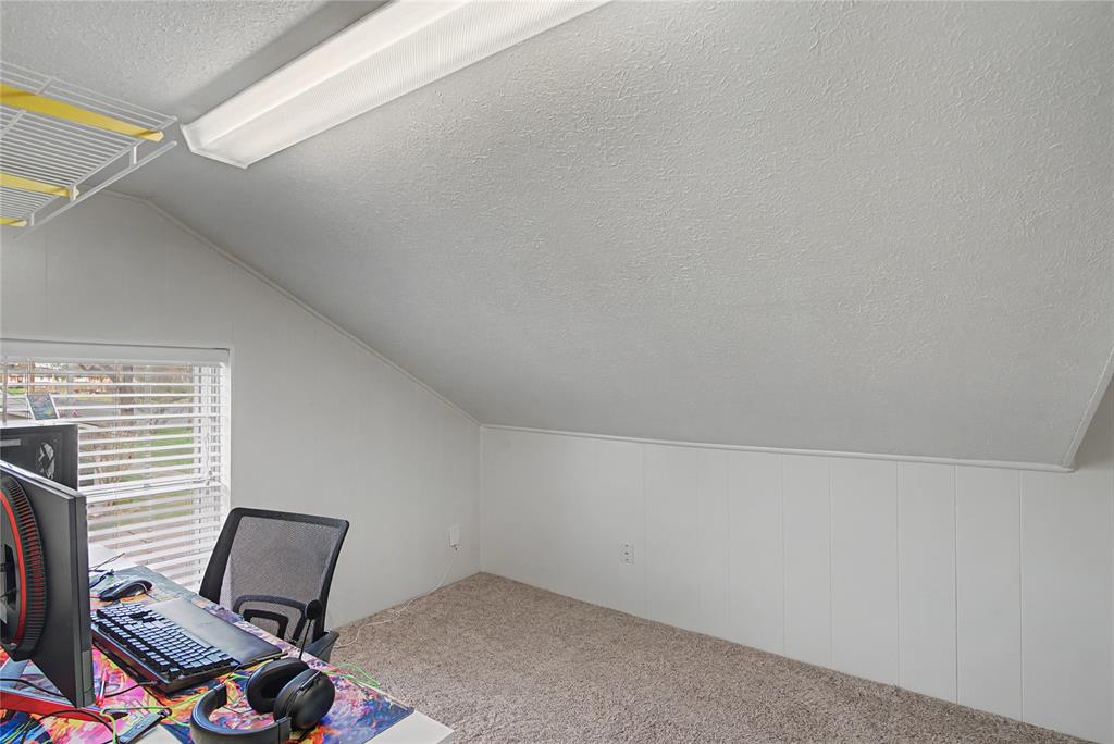 10056 Alondra Street Shreveport, LA 71115 - Photo 25 of 31 an empty room with a workspace