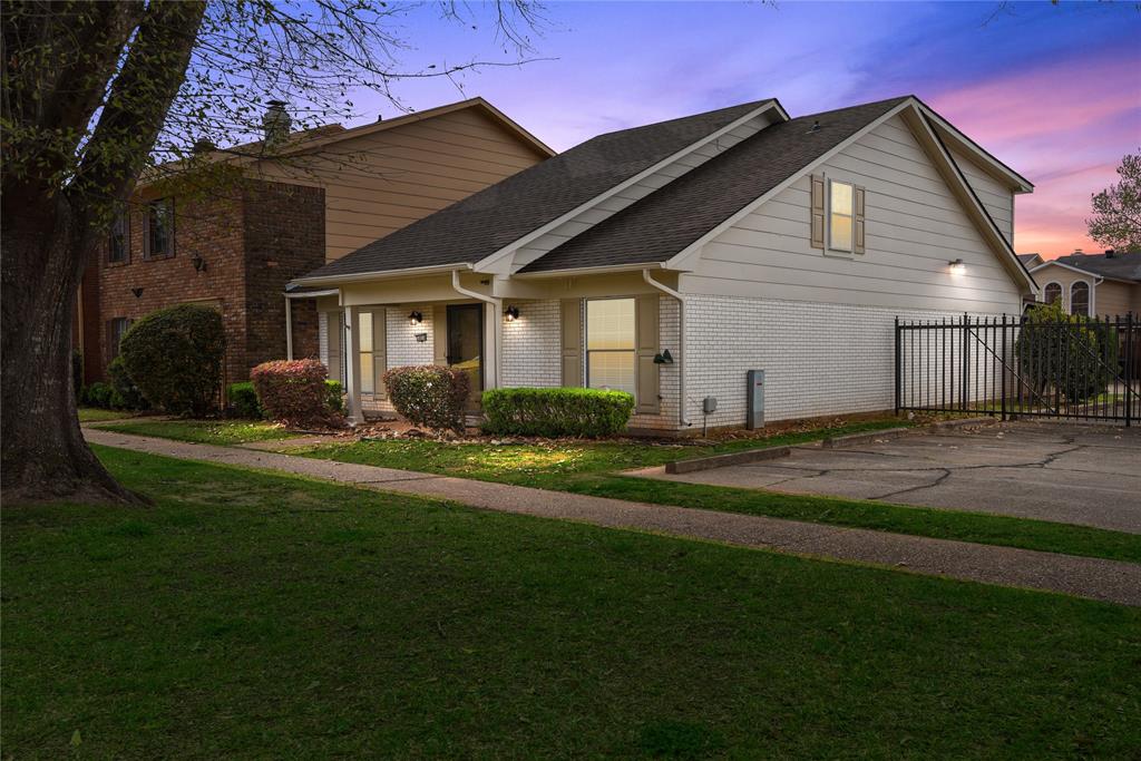 10056 Alondra Street Shreveport, LA 71115 - Photo 31 of 31 a front view of a house with a yard