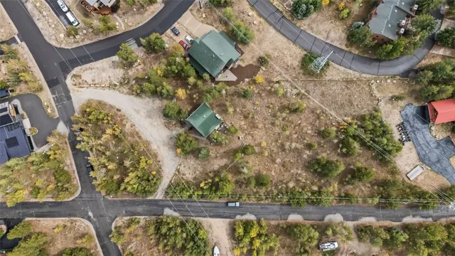 an aerial view of residential house and outdoor space