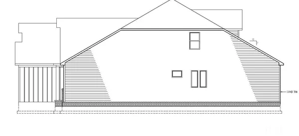 a picture of a kitchen with a refrigerator and a table