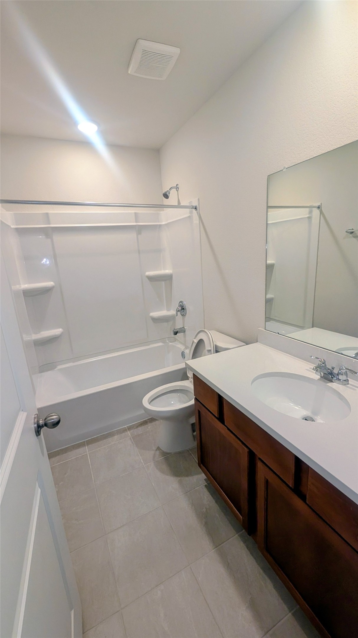 32314 Mimosa Ridge Lane Waller, TX 77484 - Photo 7 of 16 a bathroom with a sink a toilet and shower