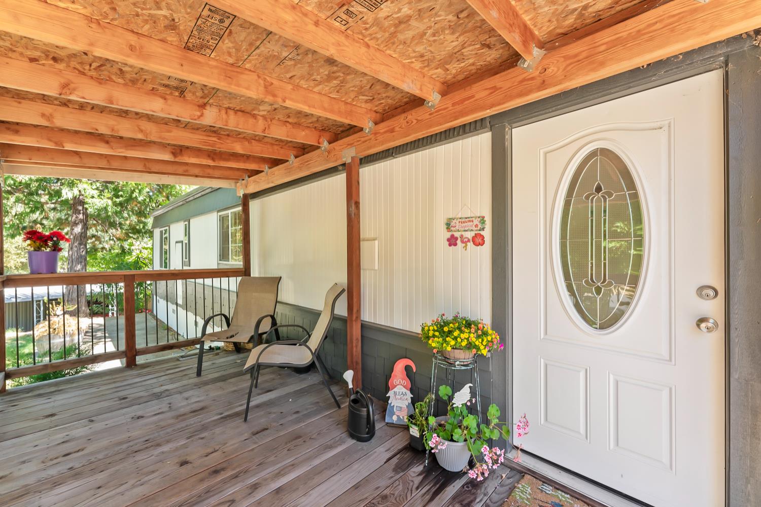 1525 Cold Springs Road, Unit 97 Placerville, CA 95667 - Photo 14 of 48 a dining room with wooden floor a glass table and chairs