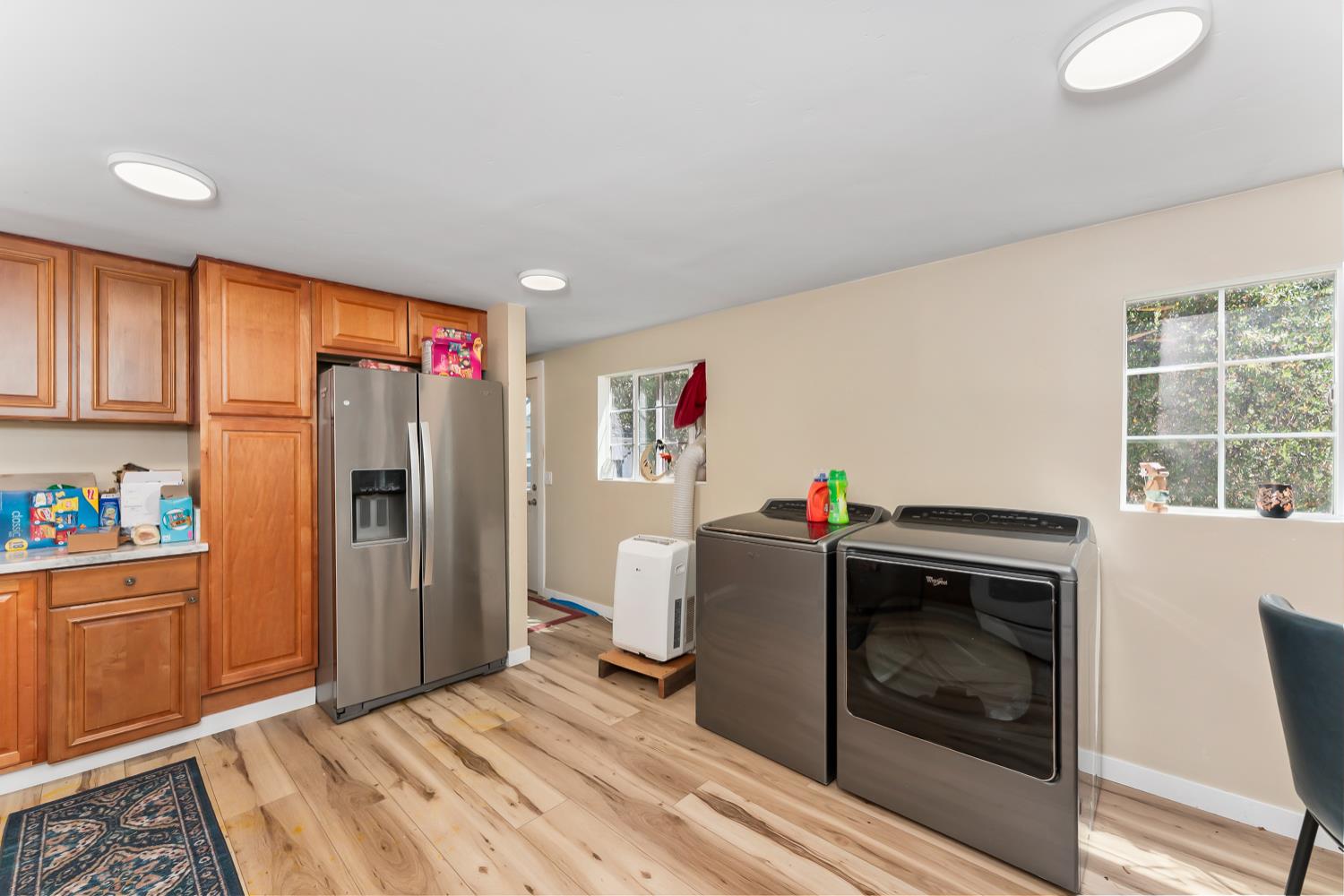 1525 Cold Springs Road, Unit 97 Placerville, CA 95667 - Photo 20 of 48 a view of a kitchen with fridge and wooden floor