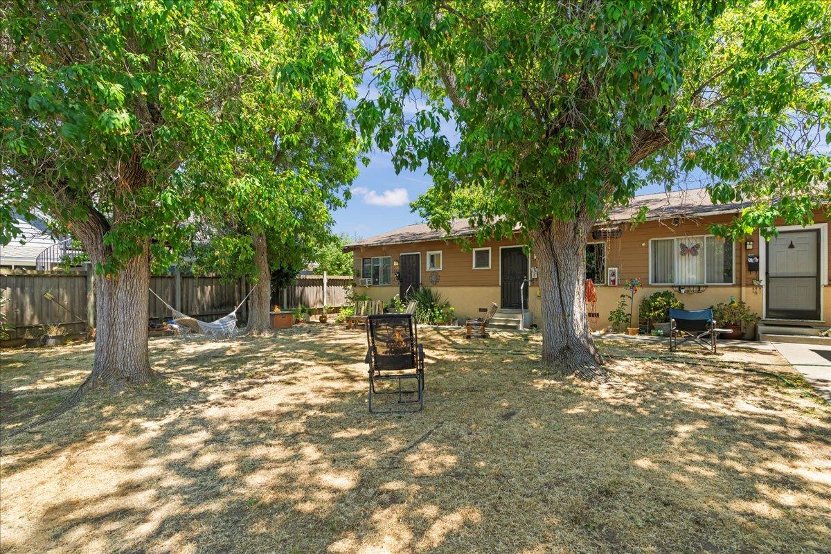 1556 Fourth Street Livermore, CA 94550 - Photo 17 of 18 a backyard of a house with table and chairs