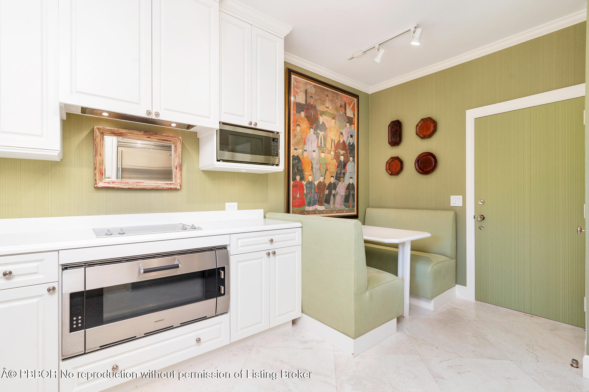 429 Australian Avenue, Unit 110 Palm Beach, FL 33480 - Photo 6 of 18 a bathroom with a sink and a mirror