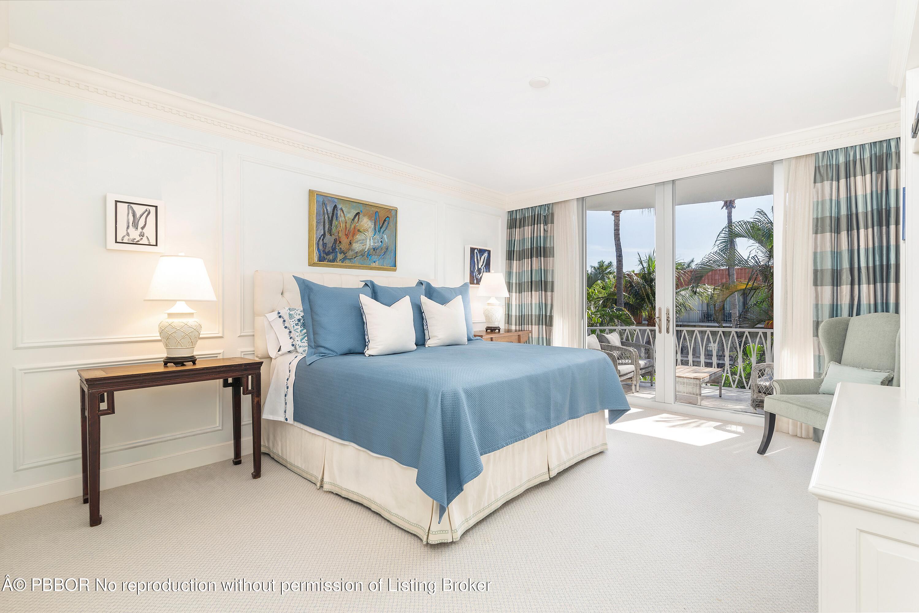 429 Australian Avenue, Unit 110 Palm Beach, FL 33480 - Photo 7 of 18 a bedroom with a bed and a desk