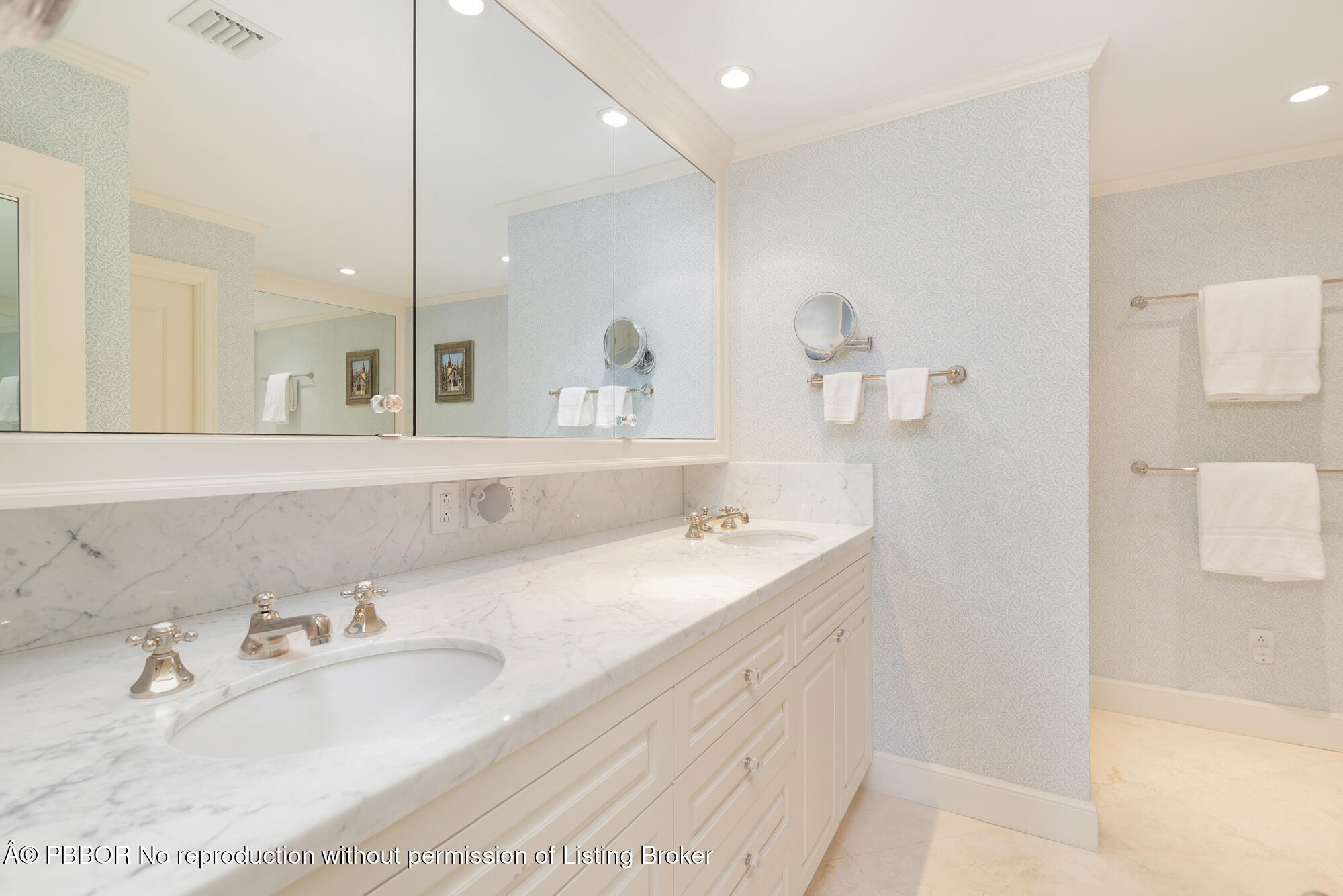 429 Australian Avenue, Unit 110 Palm Beach, FL 33480 - Photo 8 of 18 a bathroom with a sink and a mirror