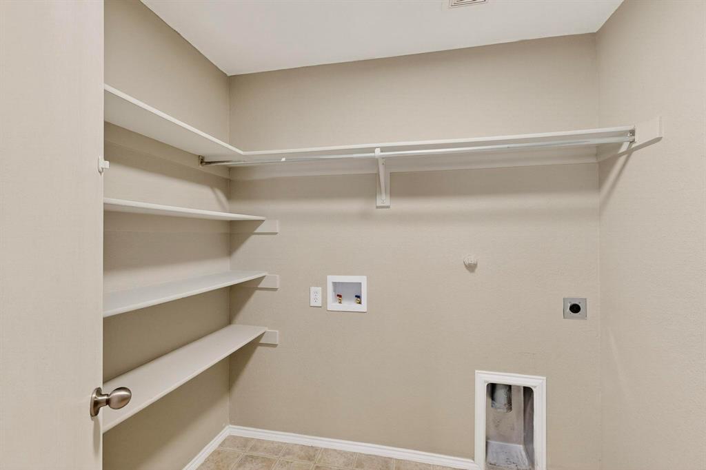 2114 Cypress Way Anna, TX 75409 - Photo 33 of 40 a view of an empty walk in closet