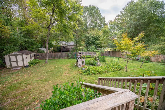 a view of a backyard with plants