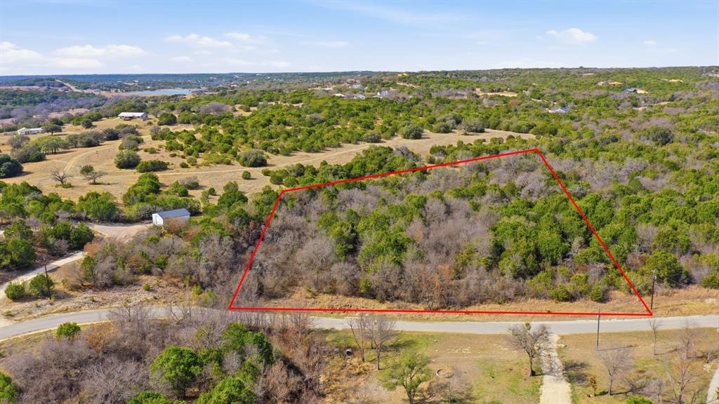 Tbd Bluegill Ridge Bluff Dale, TX 76433 - Photo 1 of 21 an aerial view of residential houses with outdoor space and trees