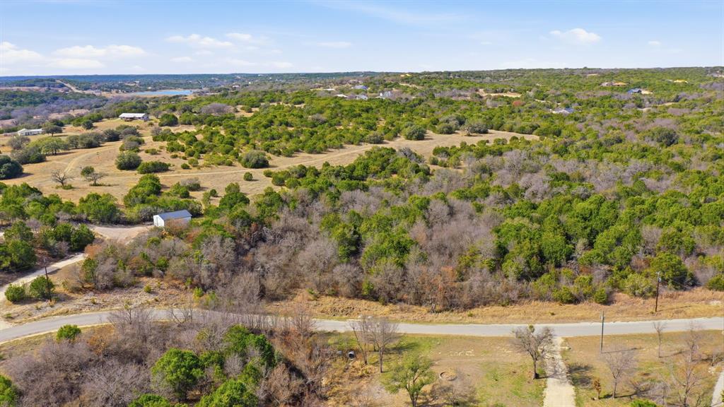 Tbd Bluegill Ridge Bluff Dale, TX 76433 - Photo 2 of 21 an aerial view of residential houses with outdoor space and trees