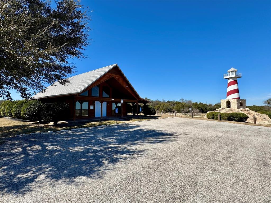Tbd Bluegill Ridge Bluff Dale, TX 76433 - Photo 21 of 21 a front view of a house with a yard