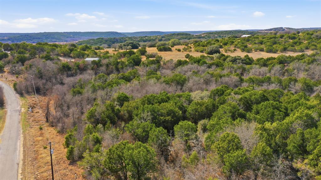 Tbd Bluegill Ridge Bluff Dale, TX 76433 - Photo 10 of 21 an aerial view of residential houses with outdoor space and trees