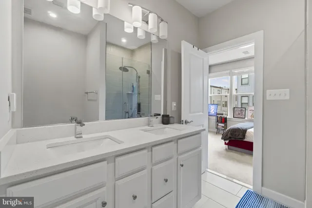 a view of a hallway with washer and dryer