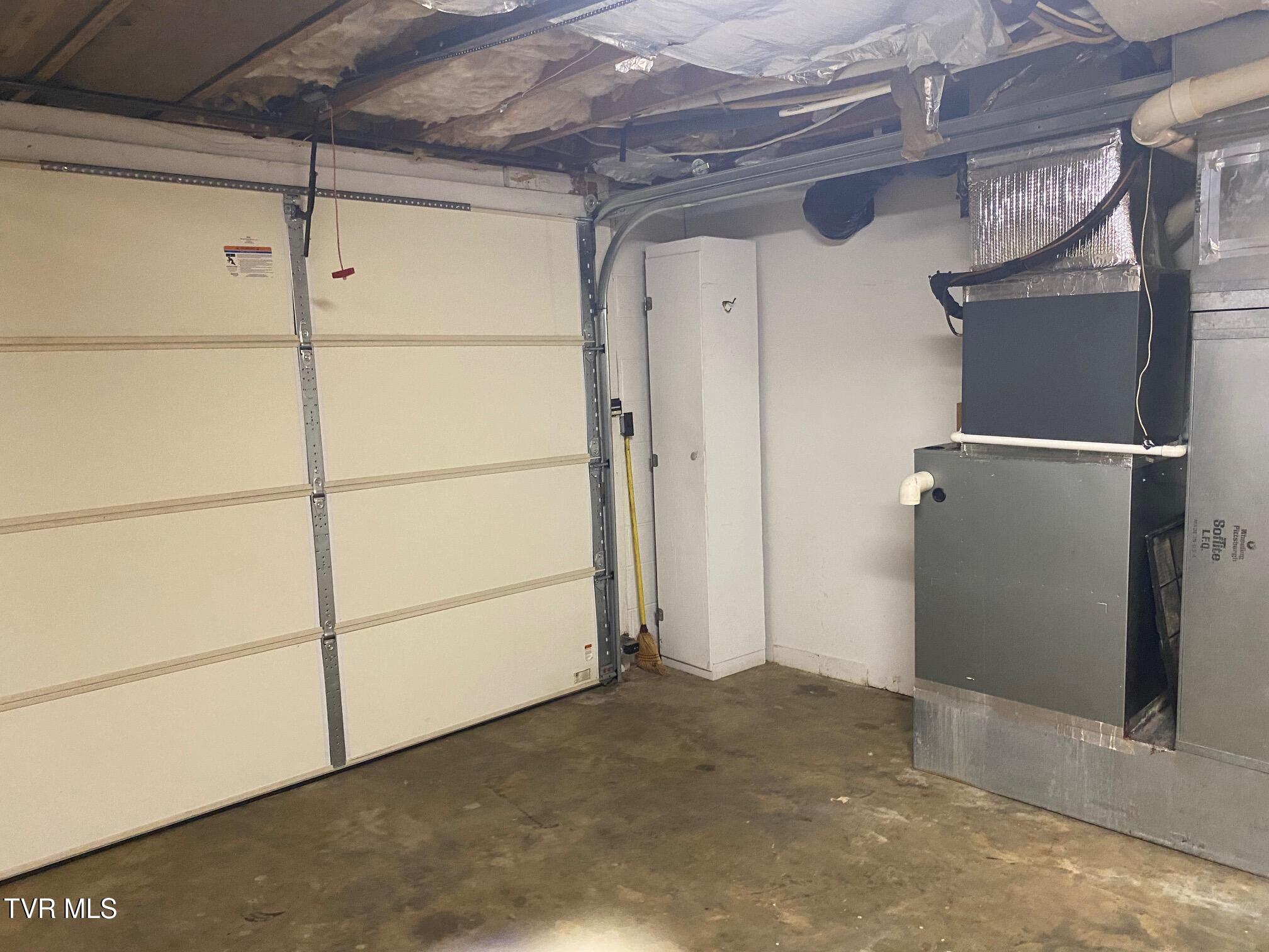 3204 Marbleton Road Unicoi, TN 37692 - Photo 88 of 114 Garage door in basement