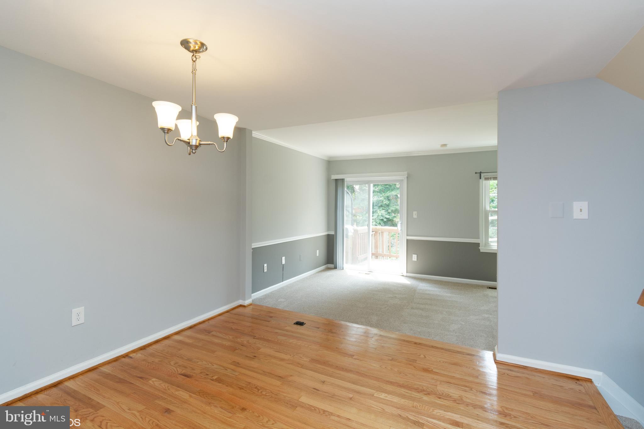 Hardwood floors in foyer, kitchen  & DR
