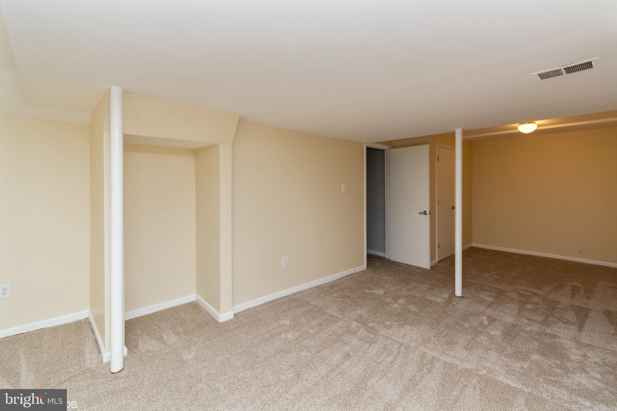 8509 Springfield Oaks Drive Springfield, VA 22153 - Photo 21 of 25 Rec room has new w/w carpet
