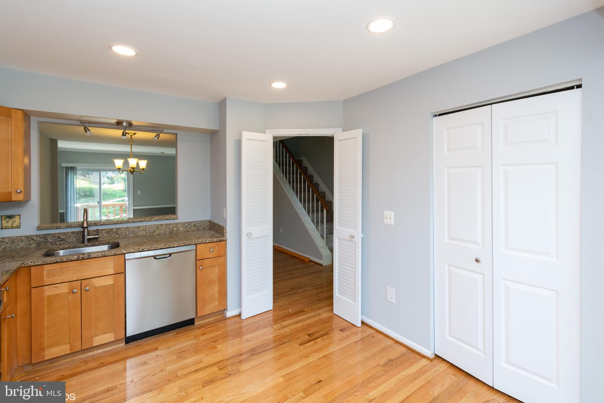 Kitchen has large double door pantry