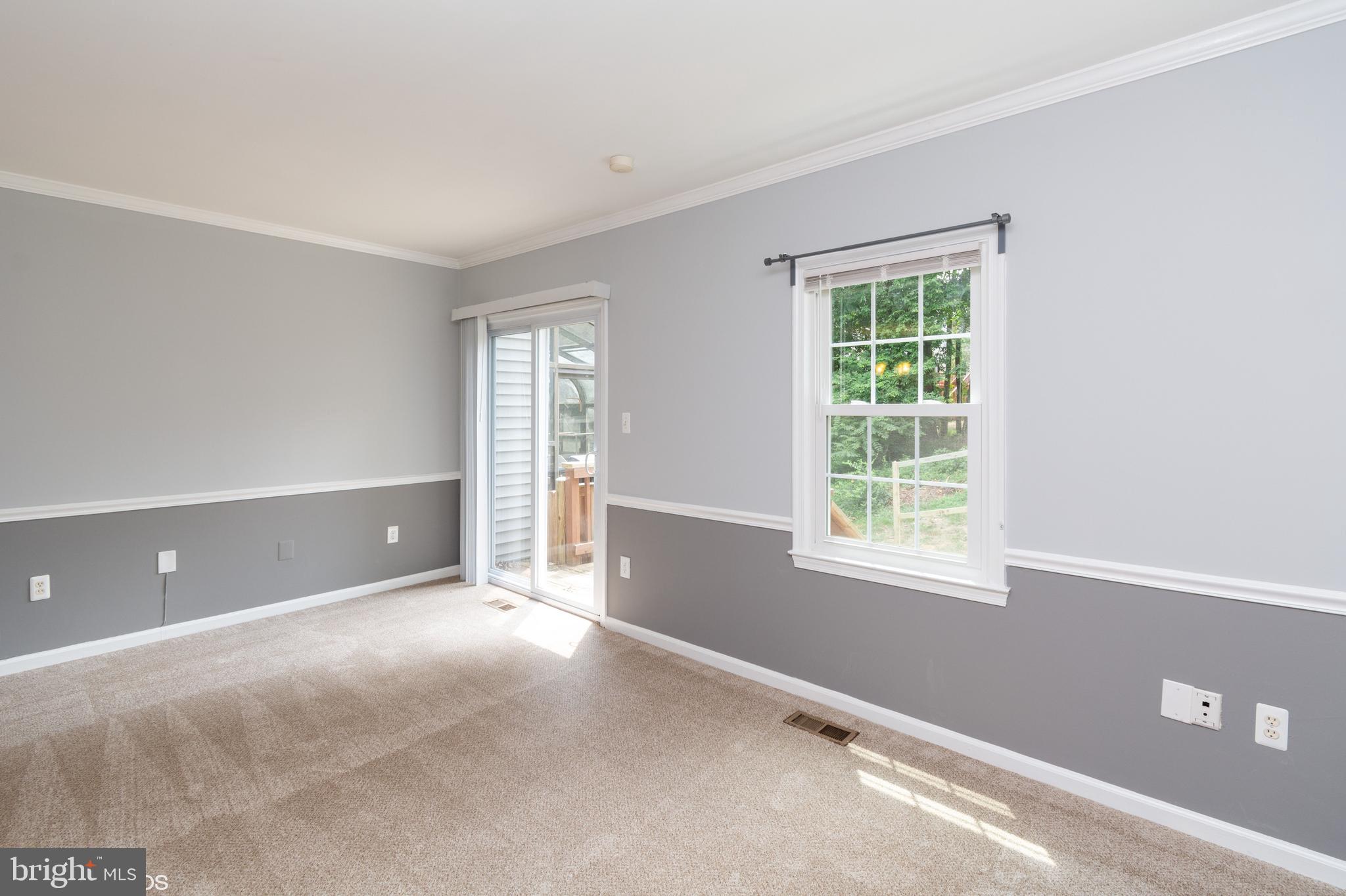 8509 Springfield Oaks Drive Springfield, VA 22153 - Photo 10 of 25 Freshly painted main level in 2-tone gray
