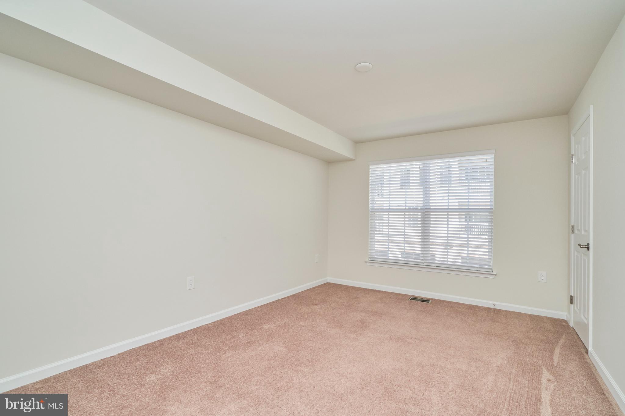 43427 Town Gate Square Chantilly, VA 20152 - Photo 10 of 11 an empty room with a window