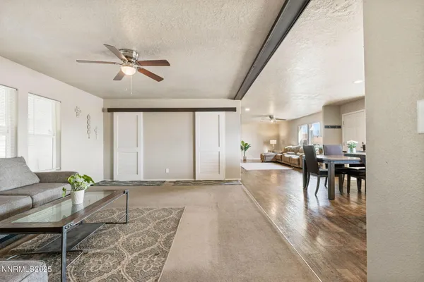 a living room with furniture and a table