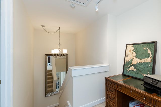 a room with a table and chairs