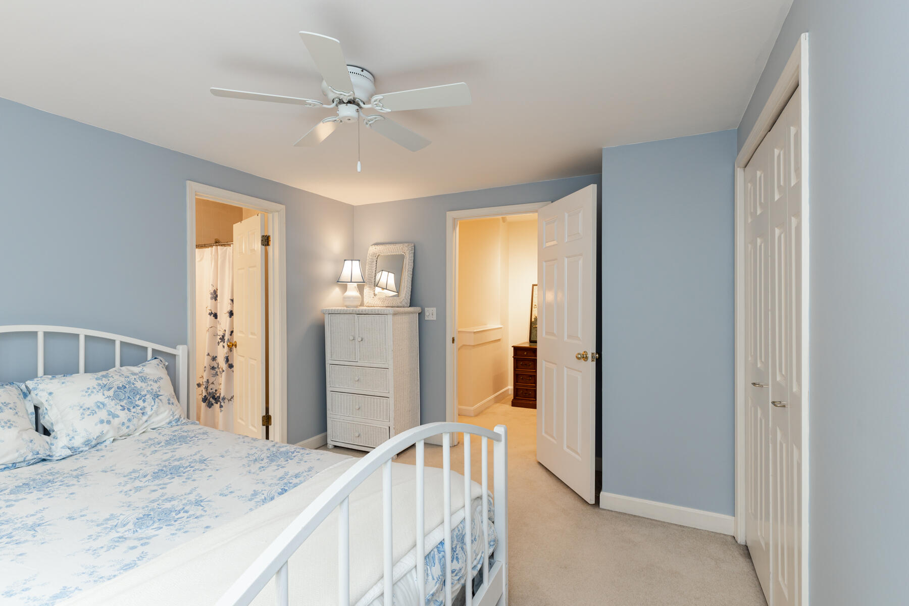 2 Bob White Crescent Mashpee, MA 02649 - Photo 33 of 47 a bedroom with a bed and a chandelier