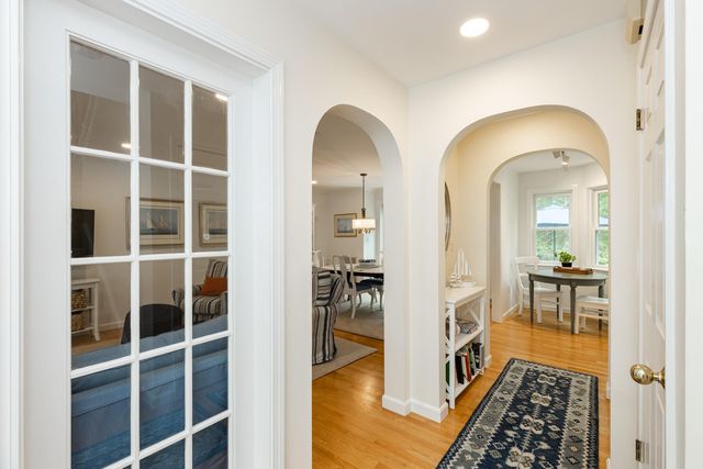 a view of living room and wooden floor