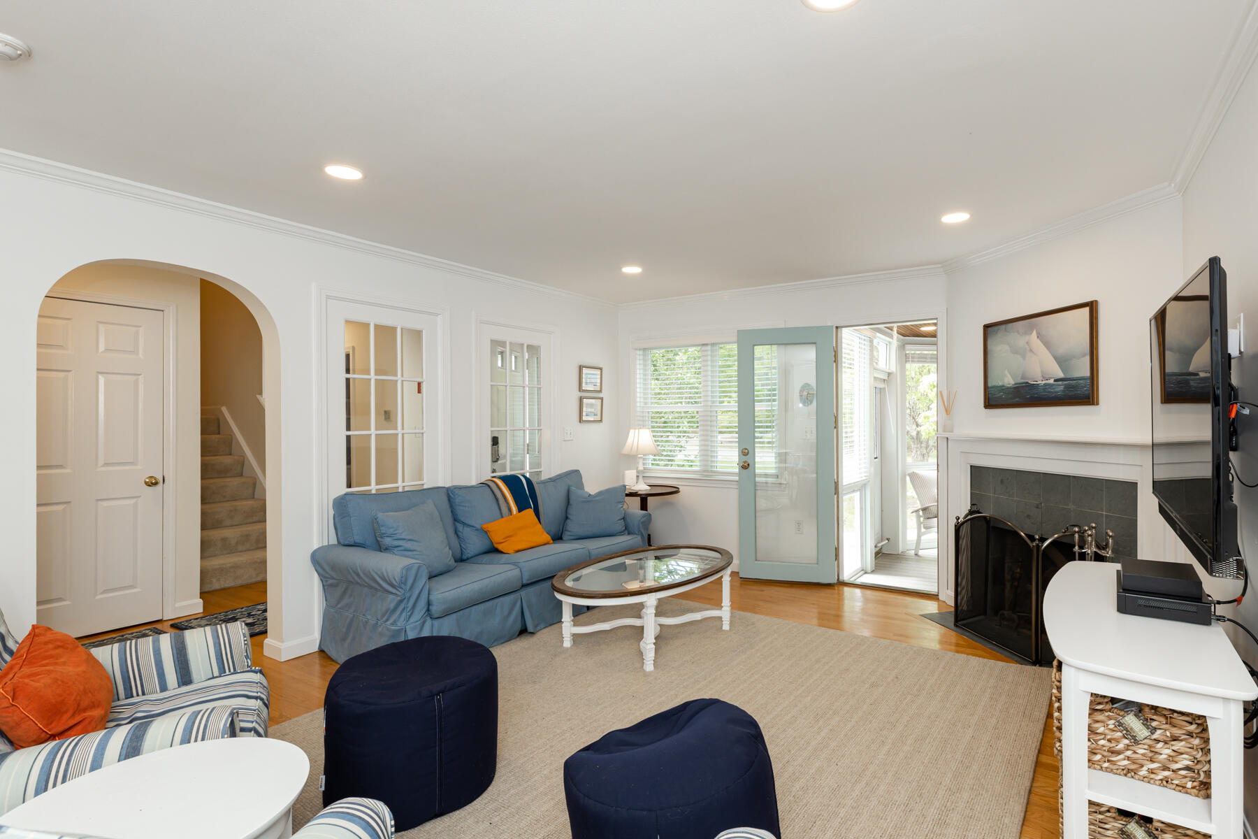 2 Bob White Crescent Mashpee, MA 02649 - Photo 10 of 47 a living room with furniture fireplace and a flat screen tv