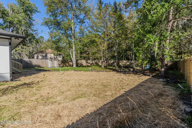 a view of outdoor space and yard