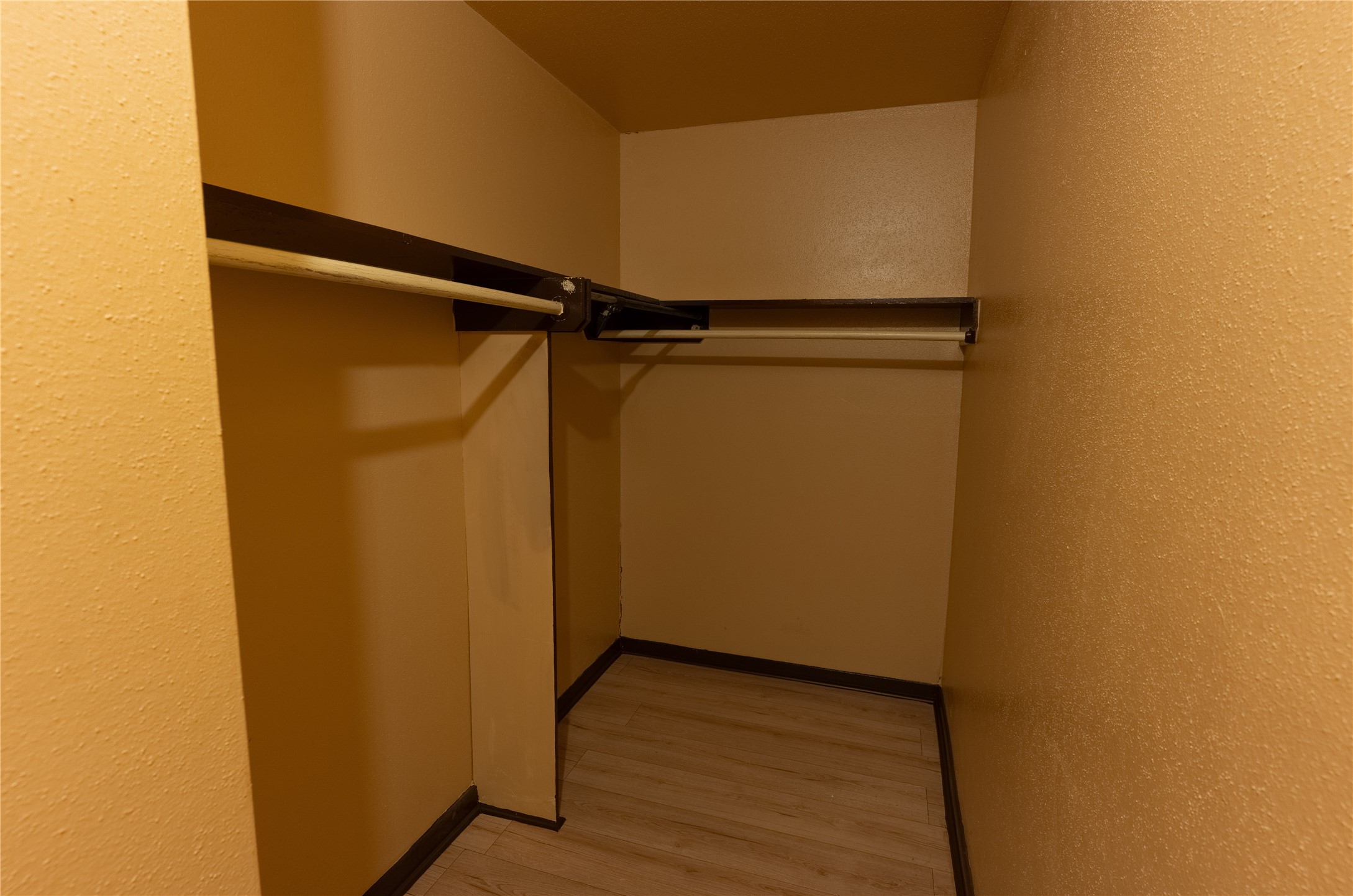 3314 Burke Road, Unit 39 Pasadena, TX 77504 - Photo 6 of 11 a view of walk in closet with empty racks