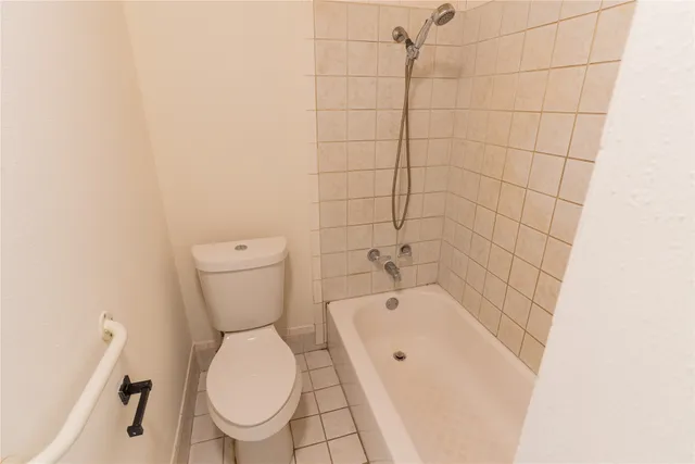 a view of a porch with furniture and backyard