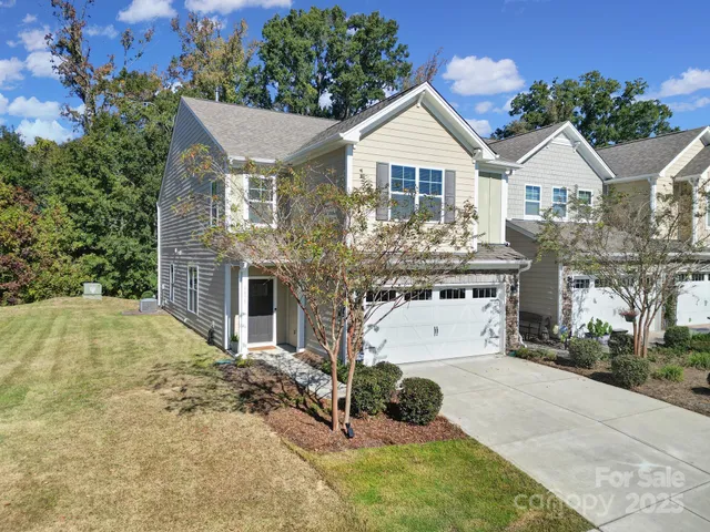 a view of a livingroom with furniture and window