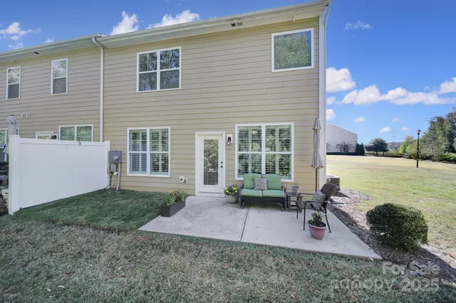 a front view of a house with yard