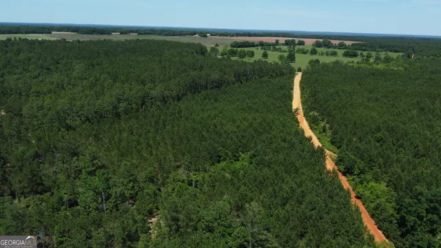 a view of a golf course with a lake