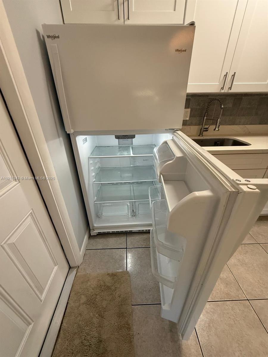 620 Southwest 7th Avenue, Unit 2 Hallandale Beach, FL 33009 - Photo 11 of 23 a view of washer and dryer