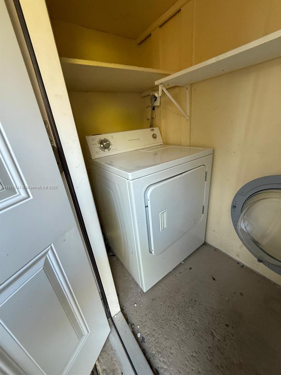 620 Southwest 7th Avenue, Unit 2 Hallandale Beach, FL 33009 - Photo 20 of 23 a utility room with dryer and washer