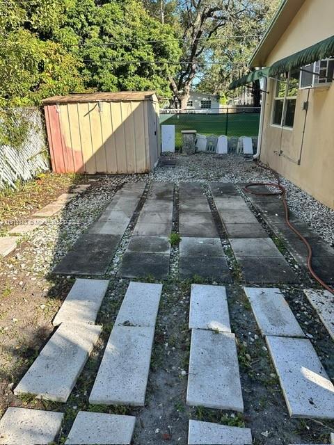 620 Southwest 7th Avenue, Unit 2 Hallandale Beach, FL 33009 - Photo 23 of 23 a view of a back yard of the house