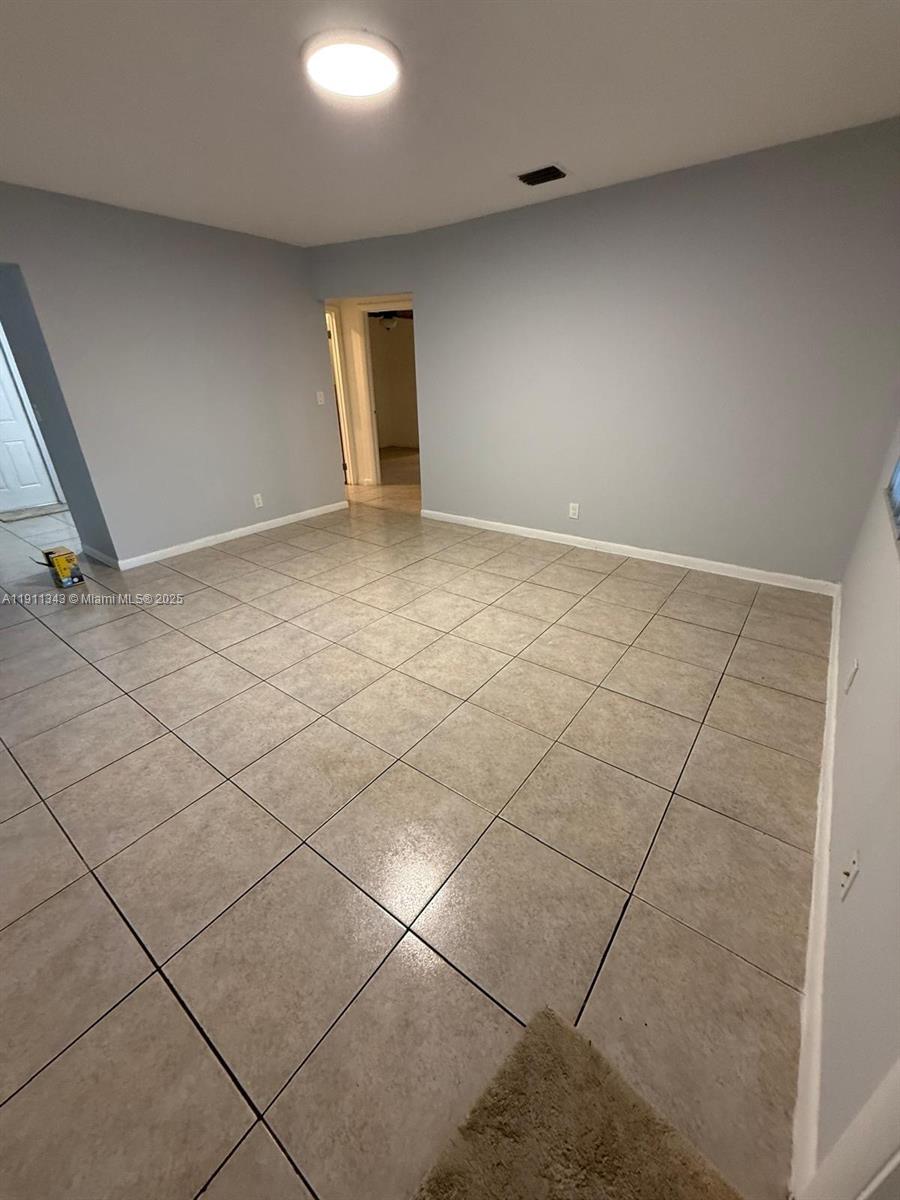 620 Southwest 7th Avenue, Unit 2 Hallandale Beach, FL 33009 - Photo 4 of 23 a view of an empty room