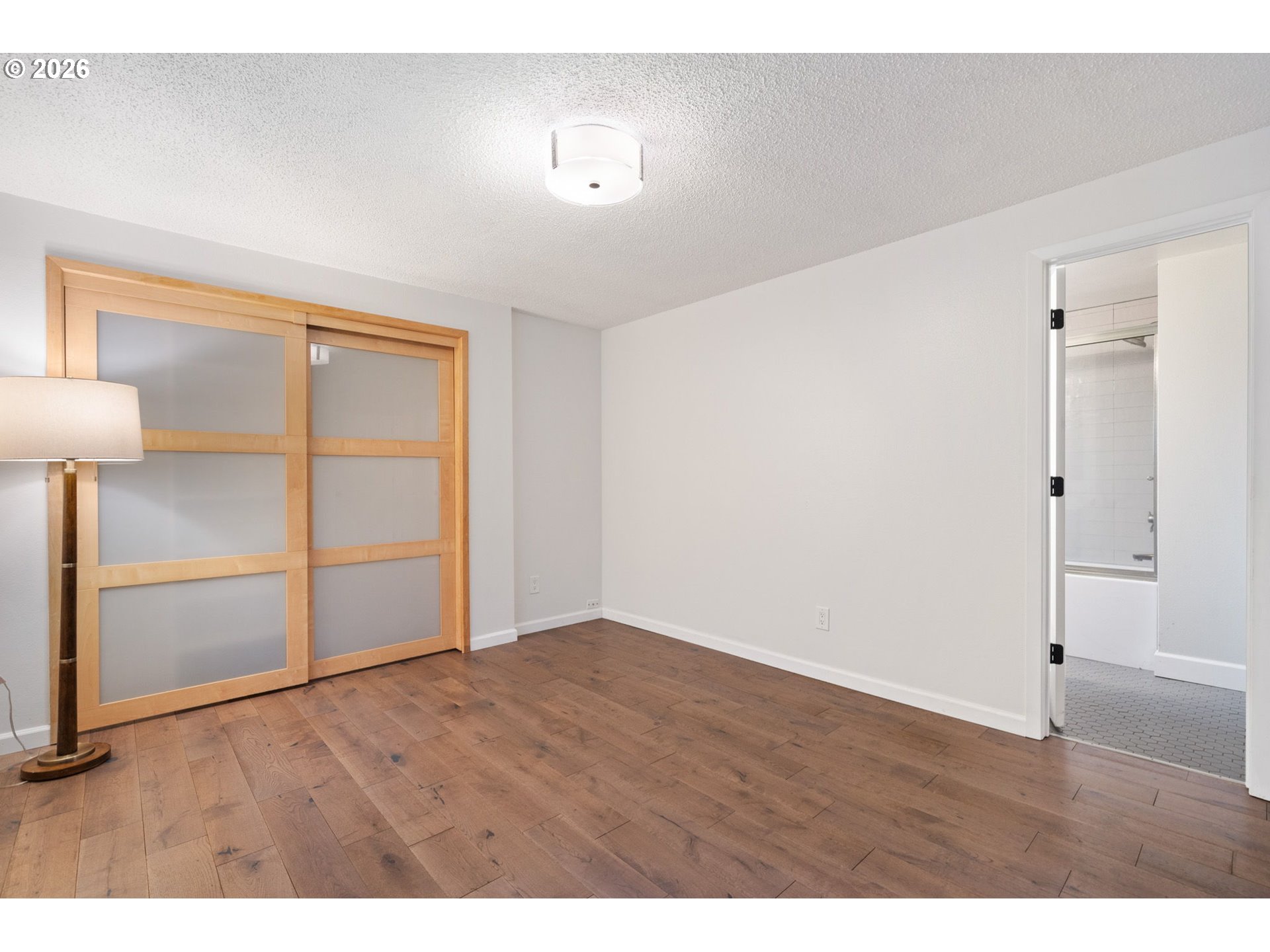5546 Sinclair Street West Linn, OR 97068 - Photo 26 of 46 a view of an empty room with wooden floor