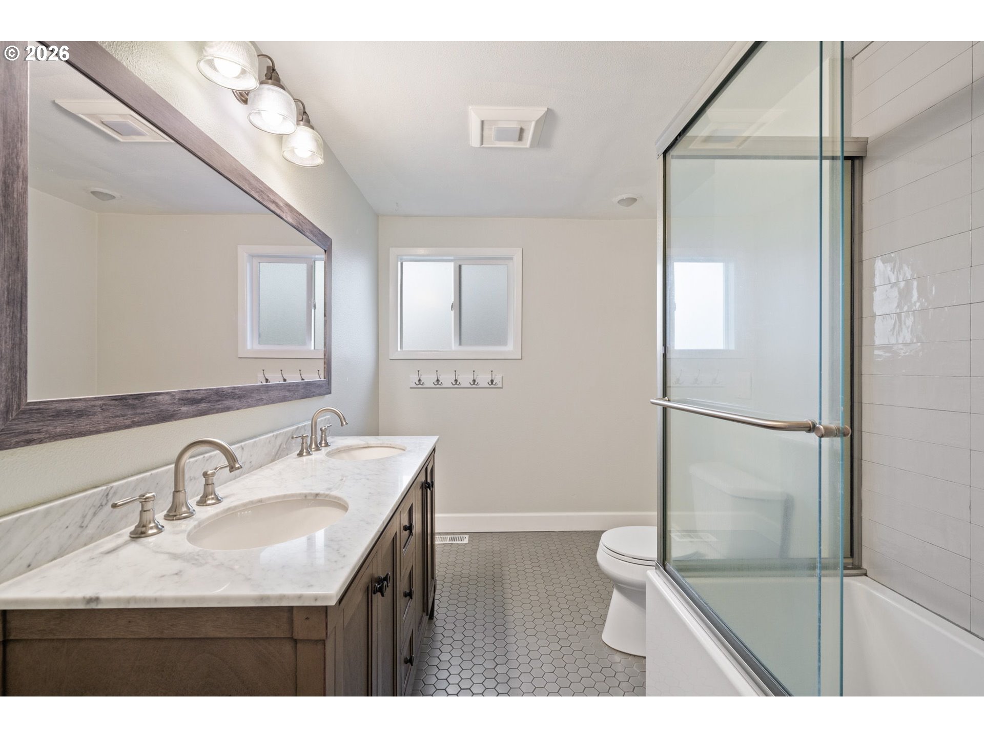 5546 Sinclair Street West Linn, OR 97068 - Photo 28 of 46 a bathroom with a sink a toilet and shower
