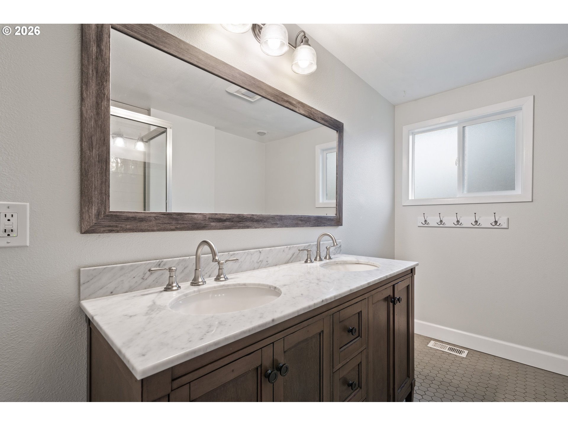 5546 Sinclair Street West Linn, OR 97068 - Photo 29 of 46 a bathroom with a sink a mirror and a vanity