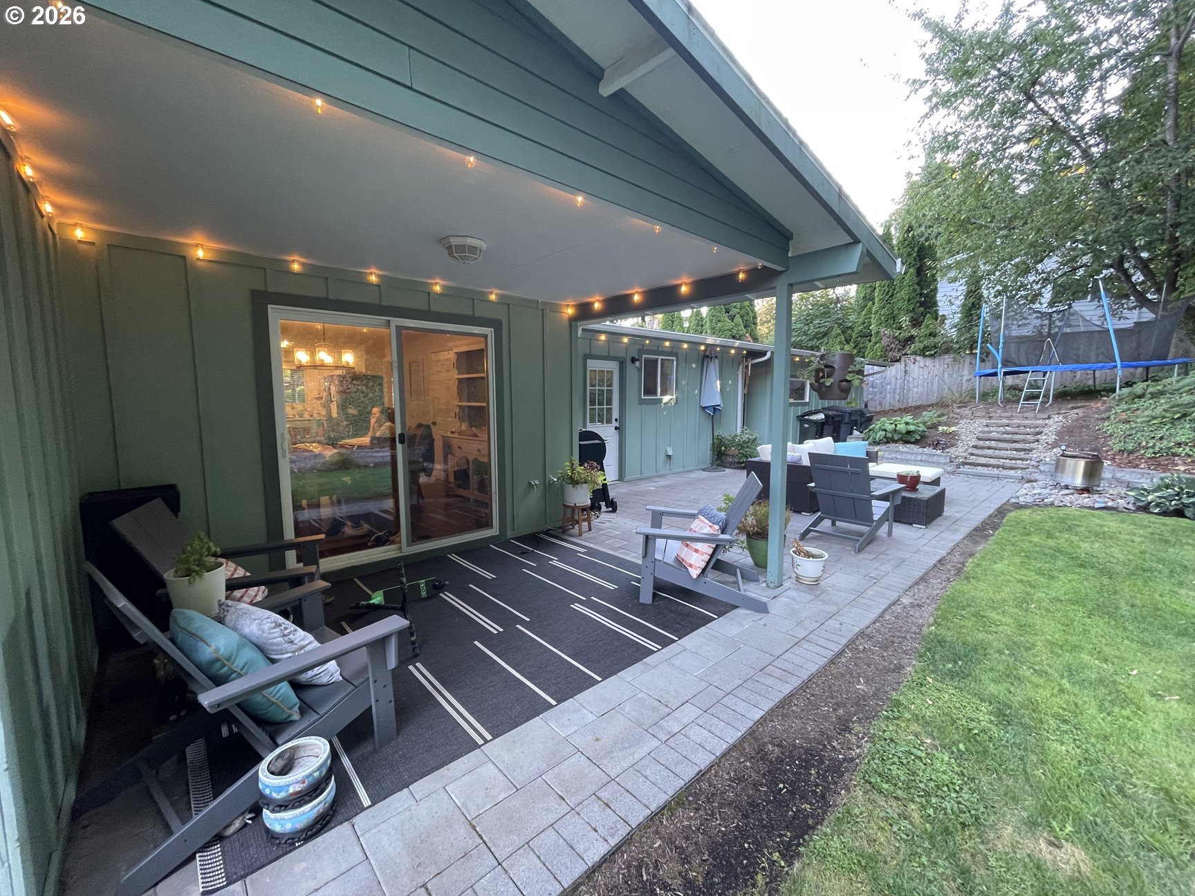 5546 Sinclair Street West Linn, OR 97068 - Photo 40 of 46 a view of a chairs and table in backyard
