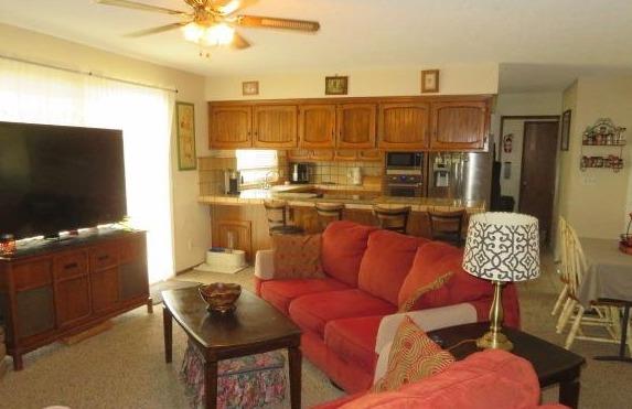 26681 Club Drive Madera, CA 93638 - Photo 13 of 41 a living room with furniture and a flat screen tv