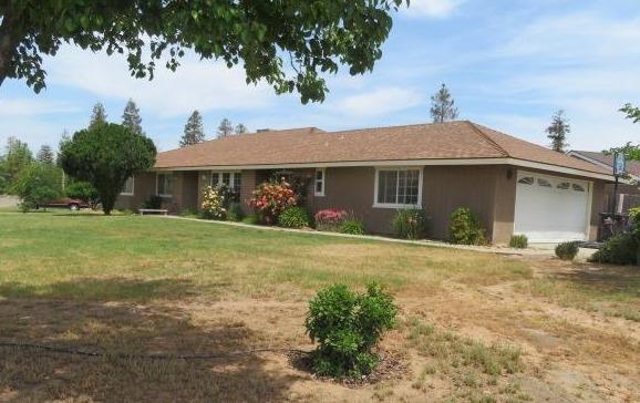 26681 Club Drive Madera, CA 93638 - Photo 41 of 41 a front view of a house with garden