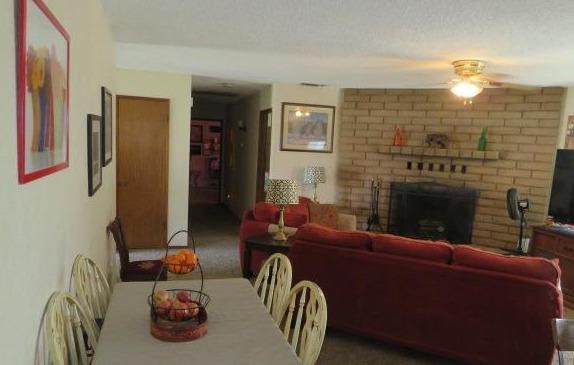 26681 Club Drive Madera, CA 93638 - Photo 7 of 41 a living room with furniture and a fireplace