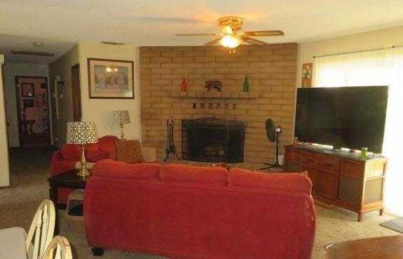 26681 Club Drive Madera, CA 93638 - Photo 9 of 41 a bedroom with a bed and a television