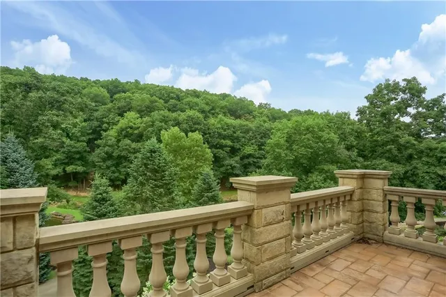 a view of a garden with a lake view